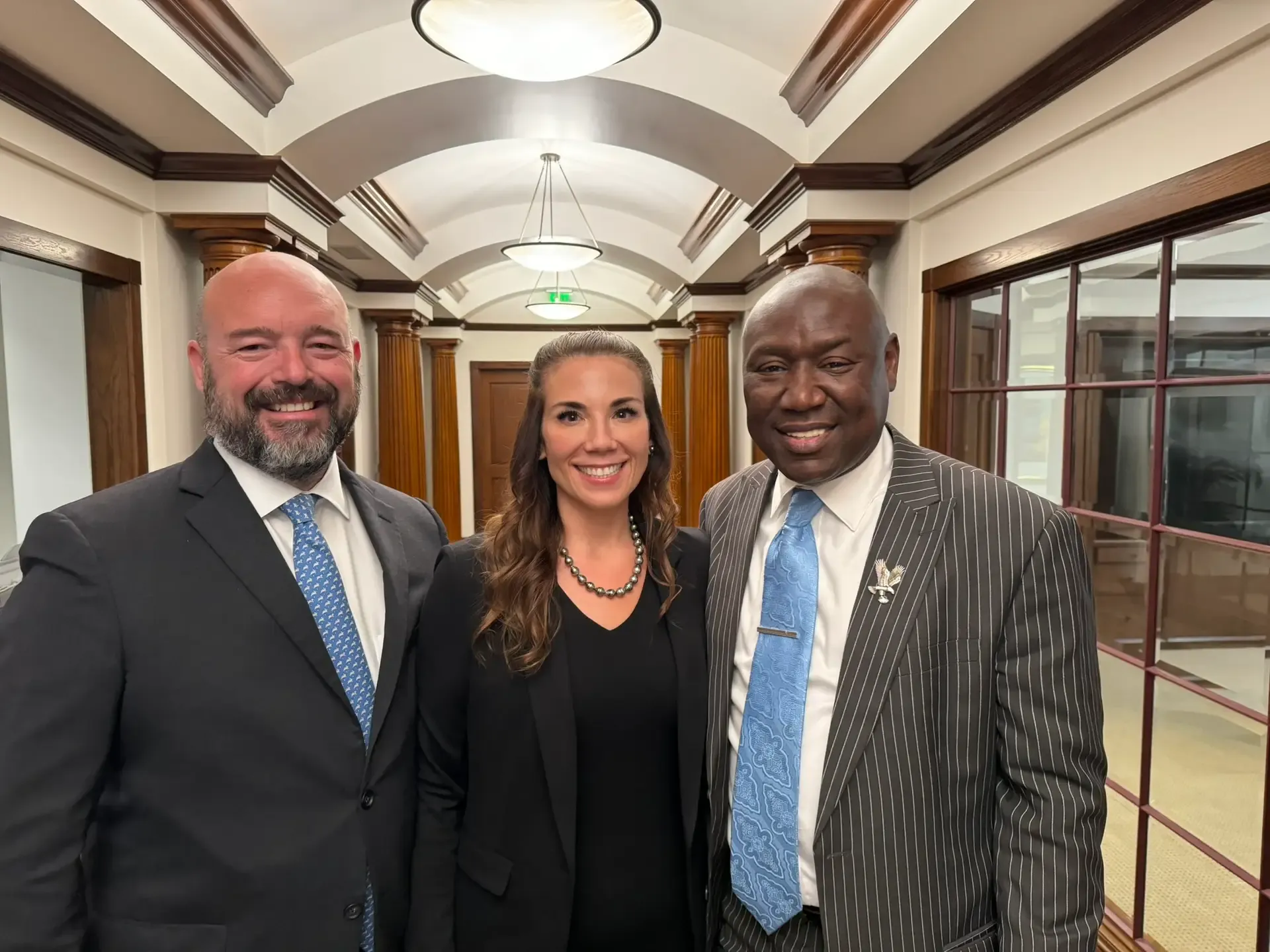 John Martinez and Marion Reilly with attorney Ben Crump