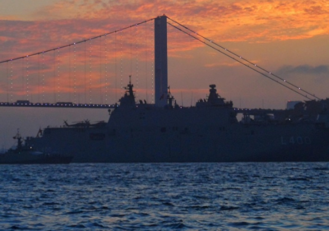 Bridge with ship at night
